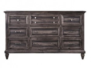 A large wooden dresser with many drawers.