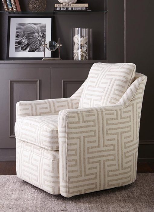 A white chair with a geometric pattern on it