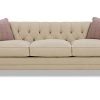 A couch with two pillows on it