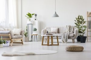 A living room with white walls and furniture.