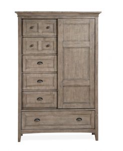 A dresser with drawers and sliding doors in the center.