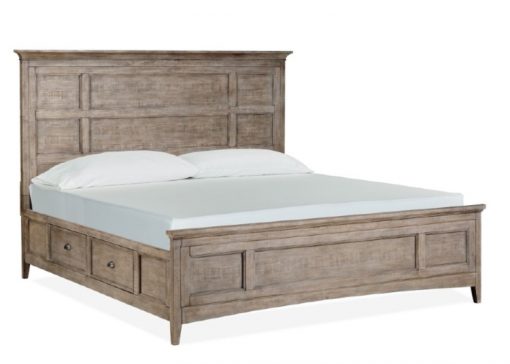 A bed with two drawers and a wooden headboard.